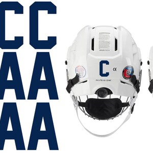 Peut inclure: Casques de hockey blancs avec des masques noirs et les lettres "C" et "A" en bleu marine. L'image montre également plusieurs lettres "C" et "A" bleu marine.