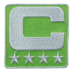 May include: Embroidered patch featuring a large white "C" on a green square background. Below the "C" are four white stars. The patch has a white border. This patch is likely for a sports team or organization.