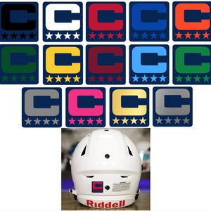May include: A collection of square decals featuring a navy blue "C" logo with varying colors and star ratings. The decals are displayed above a white football helmet with a red "Riddell" logo.