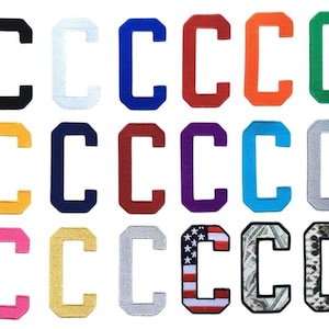 May include: A collection of twenty embroidered letter "C" patches in various colors, including black, white, blue, red, orange, green, yellow, navy, maroon, purple, teal, gray, pink, gold, and two patterned patches with an American flag and a money design.