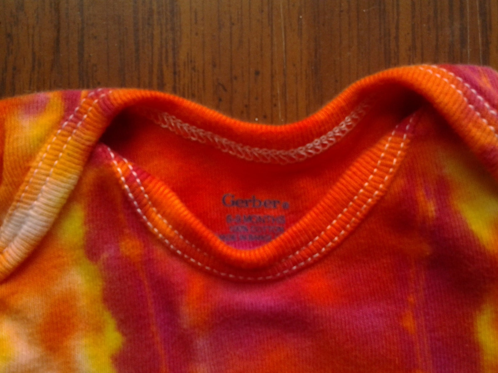 Little Mish Blue tie dye onesie