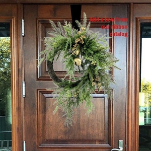 Pine and Cedar Wreath with Bells and golden berries.  Asymmetrical Holiday/Christmas Wreath