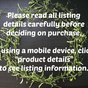 May include: A black background with a wreath of green leafy branches and small white flowers. The text "Please read all listing details carefully before deciding on purchase. If using a mobile device, click "product details" to see listing information." is written in white text.