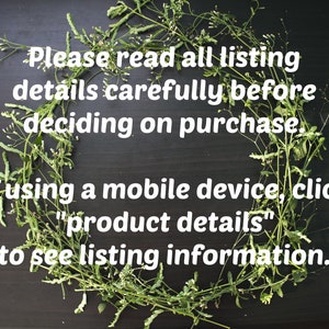 May include: A black background with a wreath of green leafy branches and small white flowers. The text "Please read all listing details carefully before deciding on purchase. If using a mobile device, click "product details" to see listing information." is written in white text.