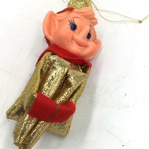 Japan knee hugger green lame fabric rubber face mid century Christmas ornament Christmas pixie