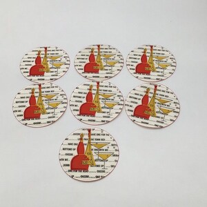 Mid century modern bottoms up, cheers, one for the road, martini red yellow coaster cocktail 1960s