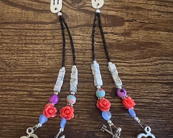 white hair clips with beads, roses, and heart and arrow charms