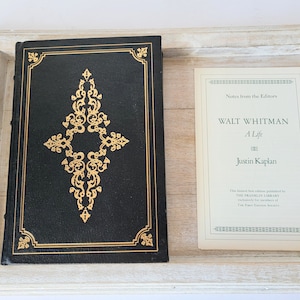 Walt Whitman. A Life. 1980. Franklin Library.Justin Kaplan. The First edition library. Black and gold ornate book.