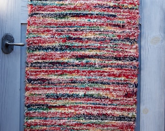 23.033  Red, Green and Blue Chorus Hand-Woven Wool Rug