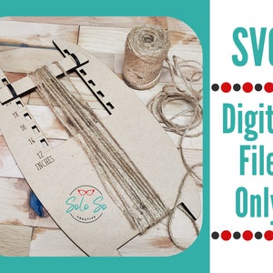 May include: A wooden craft tool with a ruler marked in inches, a slot for string, and a loop for winding. The tool is on a wooden surface with a ball of twine and a length of twine.