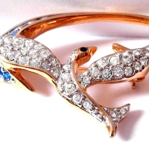 Broche con la firma de Swarovski "Paz y Libertad", edición anual 2001, nuevo en caja con certificado de autenticidad.