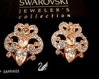 1980's Swarovski Signed Clip Earrings Gold Plated with Bezel Set and Pave Clear Crystals