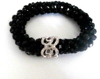 Christian Dior Signed Black Beads Braided Bracelet with Crystal Set CD Symbol