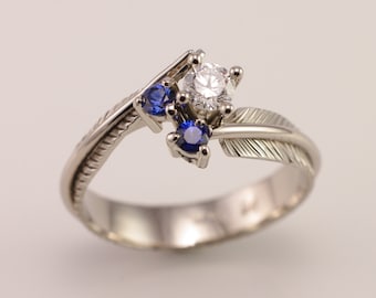 Hand Chased 18k white gold Feather Diamond and Ceylon Sapphire Engagement ring, one of a kind Hand Made by Daniel Sommerfeld in Canada