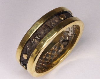 Hand Made and Hammer Forged 18k Yellow gold and Reticulated and oxidized Sterling Silver Man's Wedding Band