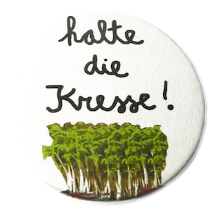 Halte die Kresse, Button, Magnet, Taschenspiegel, Flaschenöffner.