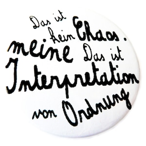 Button, magnet, pocket mirror or bottle opener, chaos