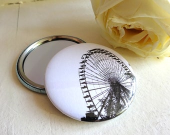 Big wheel, bottle opener, pin, magnet or compact mirror