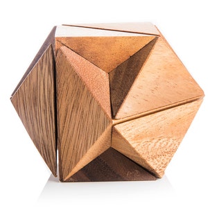 May include: A wooden geometric puzzle with a diamond shape. The puzzle is made of multiple pieces of wood that fit together to form a complex shape.