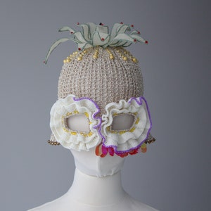 Pineapple crochet hat mask decorated with beads