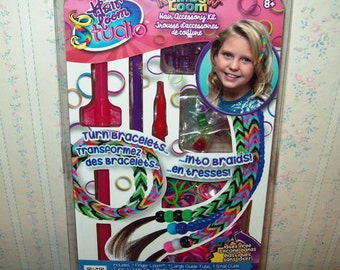 Rainbow Loom® Authentic Hair Loom Studio™ Hair Accessory Kit including tools, beads, bands, and instruction manual.