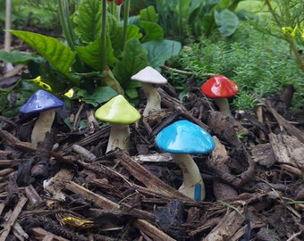 Small Ceramic Twisted Mushroom House for plant pots, fairy garden, pot gardens or terrariums.