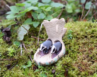Badger sett with badgers