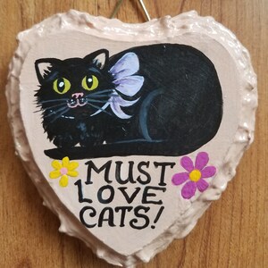 Must love Cats, small hanging ornament hand painted on pink wooden heart