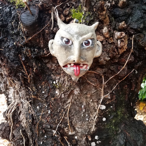 Creepy ceramic garden / home gargoyle with doll eyes and resin teeth