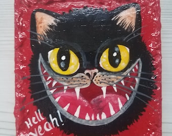 Laughing black cat face hand painted on reclaimed wood with textured edging and the words 'Hell yeah!