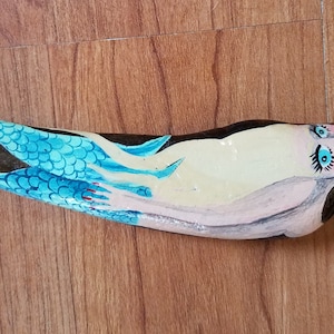 Small blonde mermaid hand painted on driftwood piece