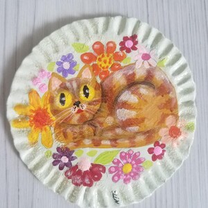 Ceramic little wall plate hand painted with orange stripey cat and flowers