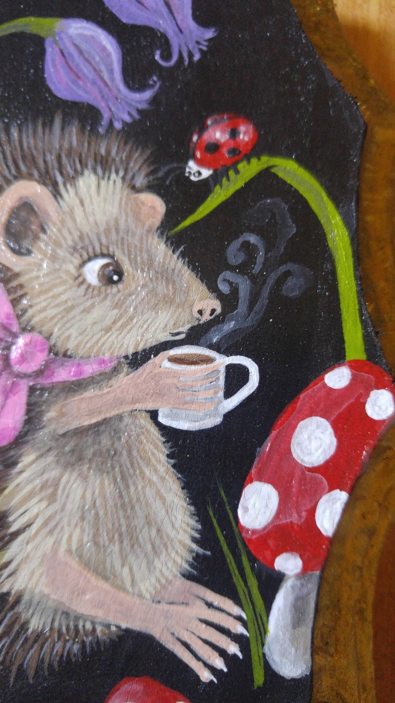Hedgehog drinking a cup of tea sitting amongst magic mushrooms and bluebells Hand painted on decorative wood piece