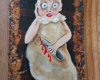 Do something witchy. Miniature creepy doll on wood using oil pastels and ink