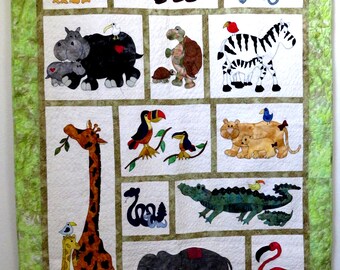 Mom with baby animals quilt.