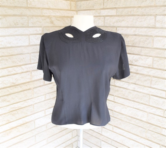Vintage 1950s black crepe back button blouse with