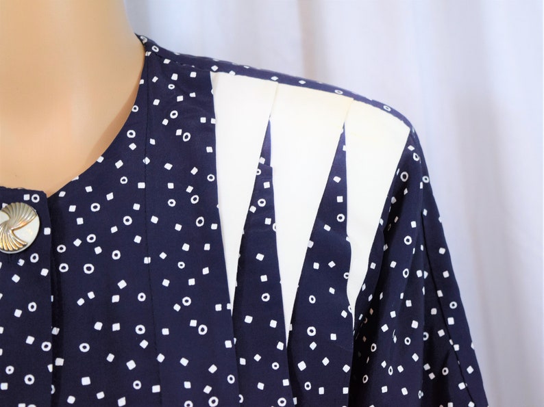 Vintage 1980s Positive Influence navy blue with white geometric dots and trim button front elbow length sleeves