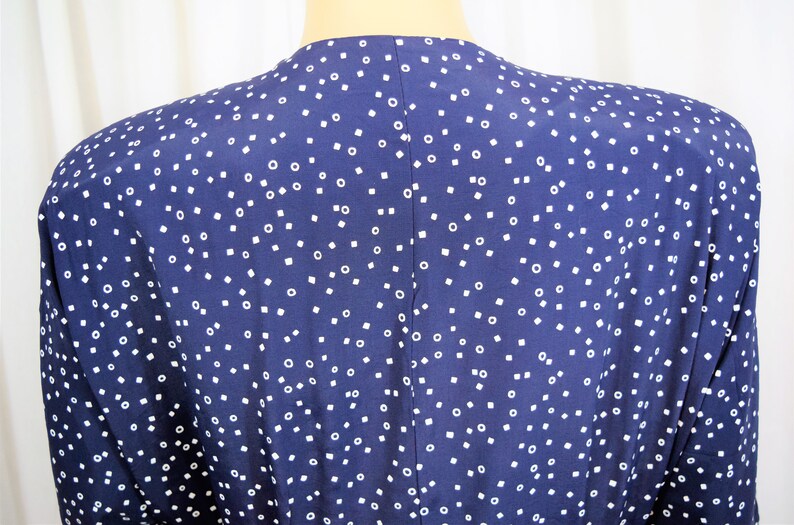 Vintage 1980s Positive Influence navy blue with white geometric dots and trim button front elbow length sleeves