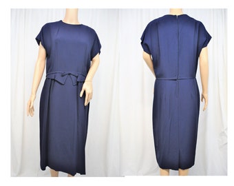 Vintage 1950s navy blue cap sleeve accented waist jewel neck lined dress