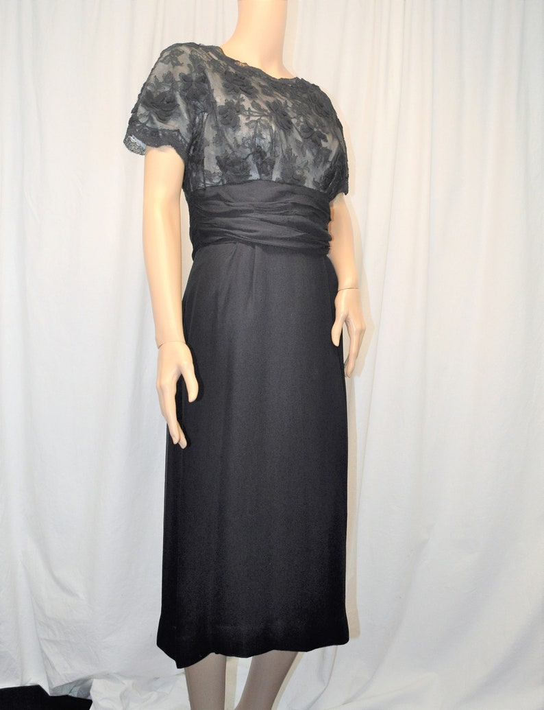 Vintage 1950s black crepe and lace cocktail dress with straight skirt and lace underlined bodice image 2