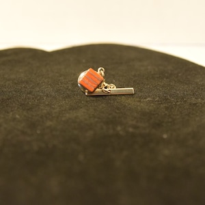 Vintage 1960s 1970s pewter tone with red stone tie tac