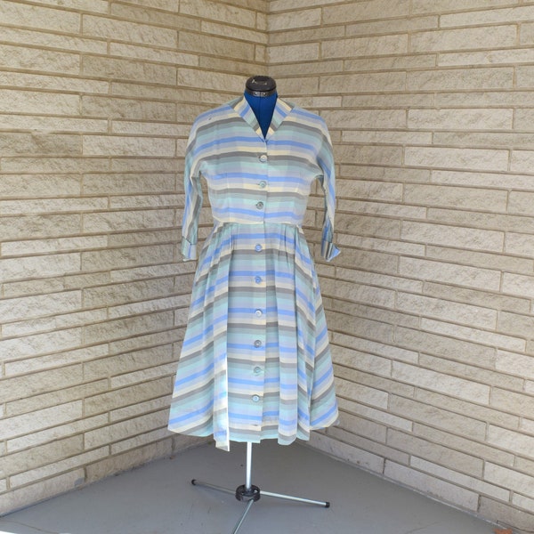 Vintage 1950s 1960s silk striped button front day dress in shades of gray and blue, elbow length cuffed sleeves