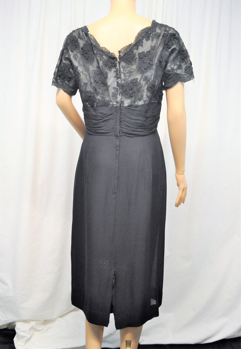 Vintage 1950s black crepe and lace cocktail dress with straight skirt and lace underlined bodice image 4