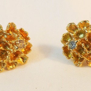 Vintage Avon marked gold tone and diamante clip back earrings