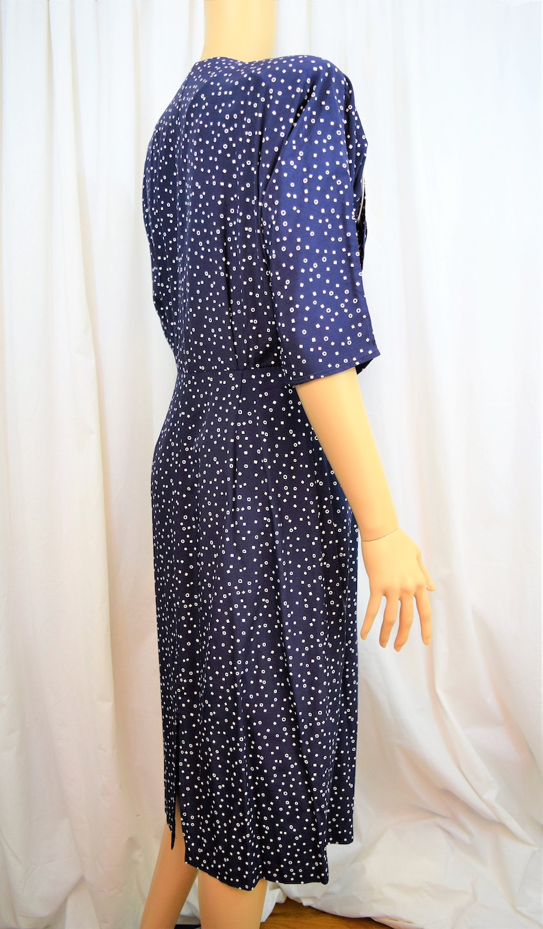 Vintage 1980s Positive Influence navy blue with white geometric dots and trim button front elbow length sleeves