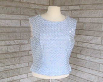Vintage 1960s sleeveless light blue shell heavily beaded and embellished with zipper back