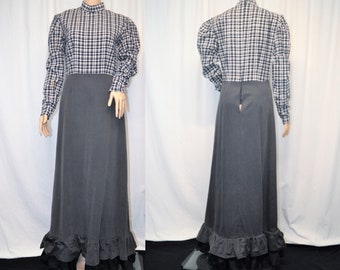 Vintage 1970s 1980s black and white plaid bodice floor length maxi gown with long sleeves and solid black ruffled skirt