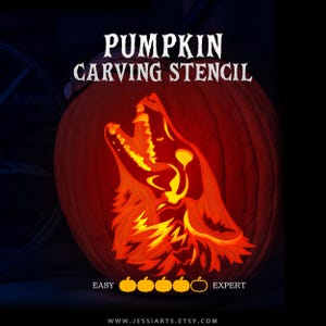 May include: A carved orange pumpkin featuring a glowing silhouette of a howling wolf. The text PUMPKIN CARVING STENCIL appears at the top, with a difficulty scale labeled EASY to EXPERT and the URL WWW.JESSIARTS.ETSY.COM at the bottom.