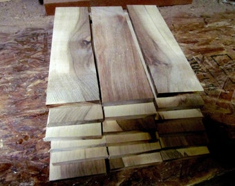 1/8": 50 piezas de madera fina de nogal secada al horno y lijada de 12" x 3" x 1/8"