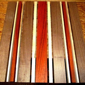 African Padauk and Maple wood end grain cutting board. 15” x 12” x 1.25”